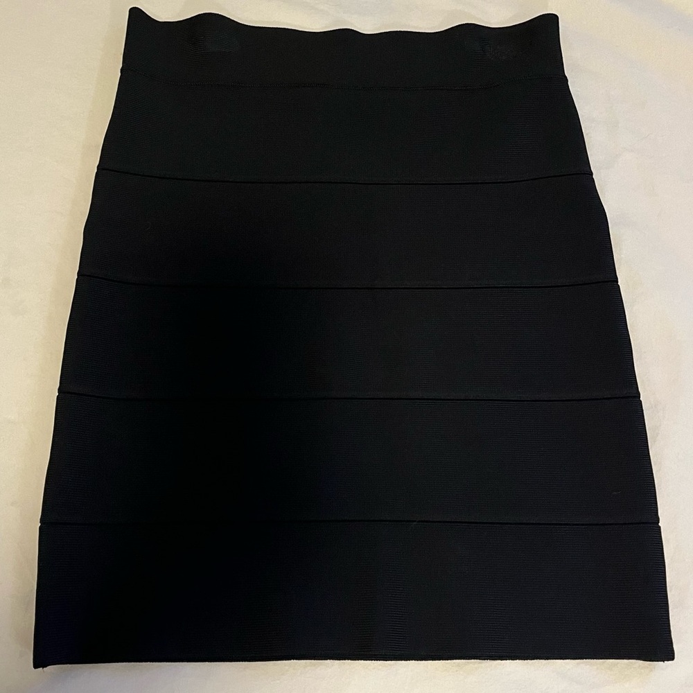 Size small sexy black stretch mini skirt in supportive, firm, quality fabric